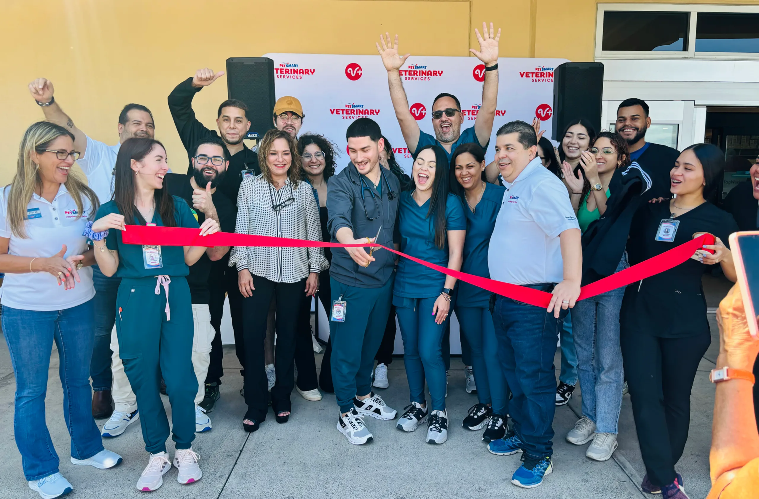Cutting the ribbon at the grand opening