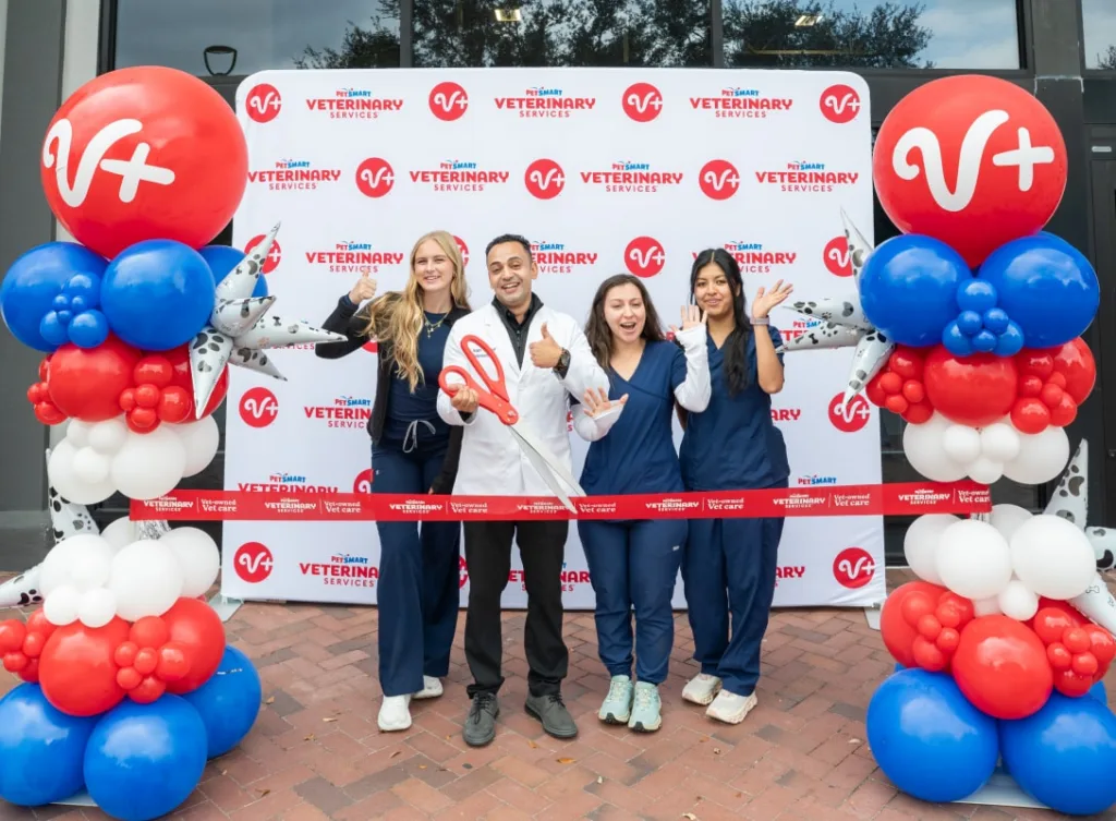 Vetwerinary staff at a ribbon-cutting ceremony.