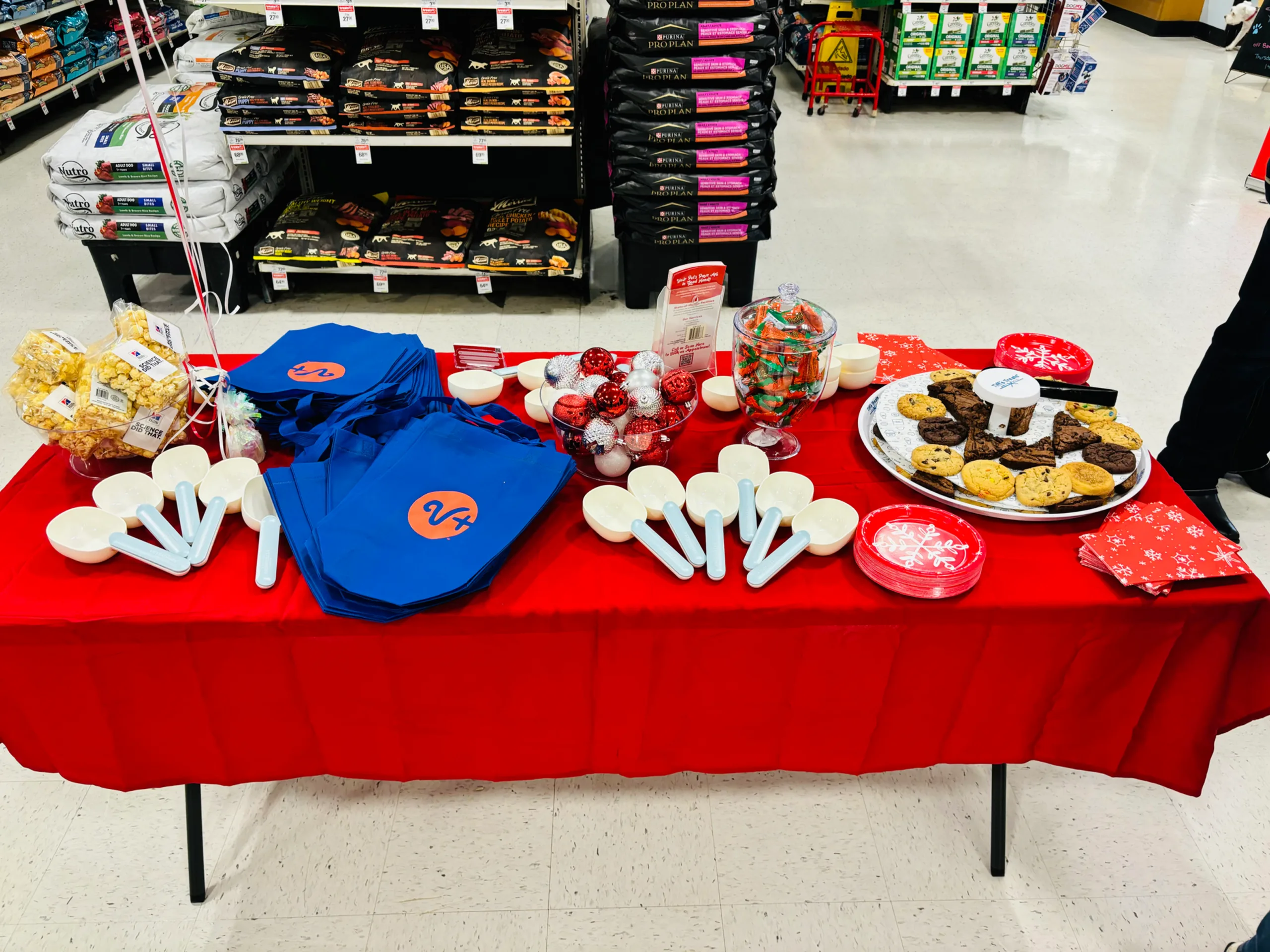 Table of free goodies at the grand opening