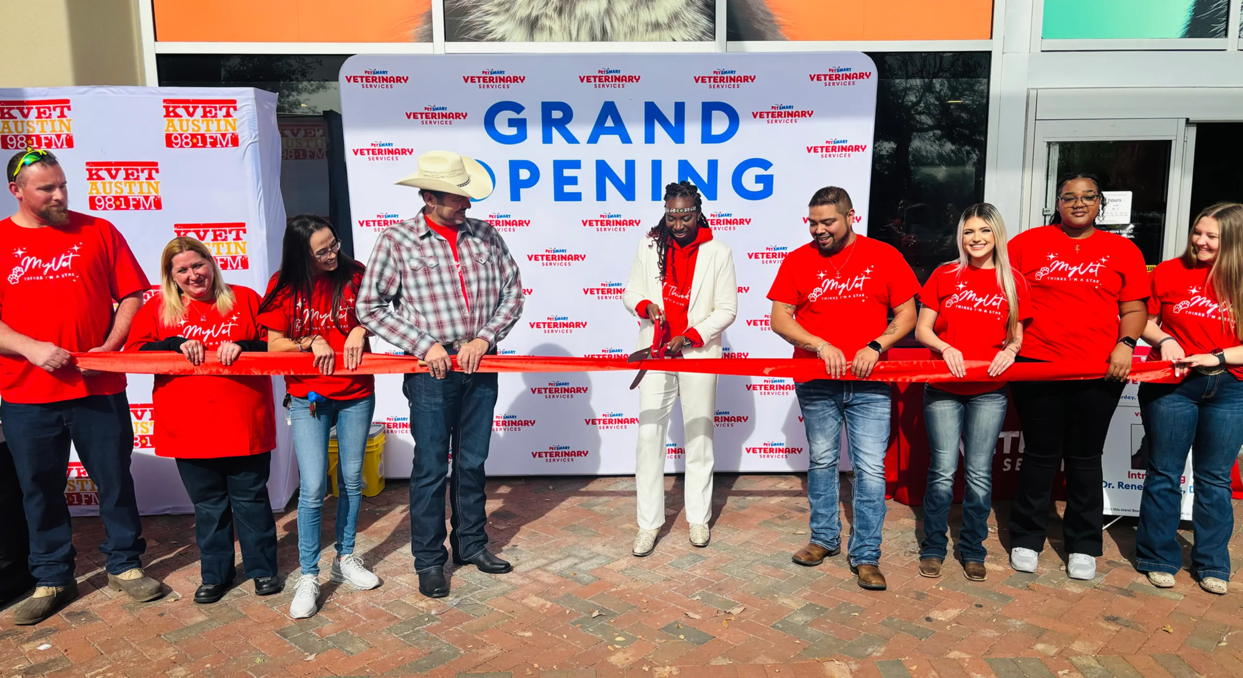 Cutting the grand opening ribbon