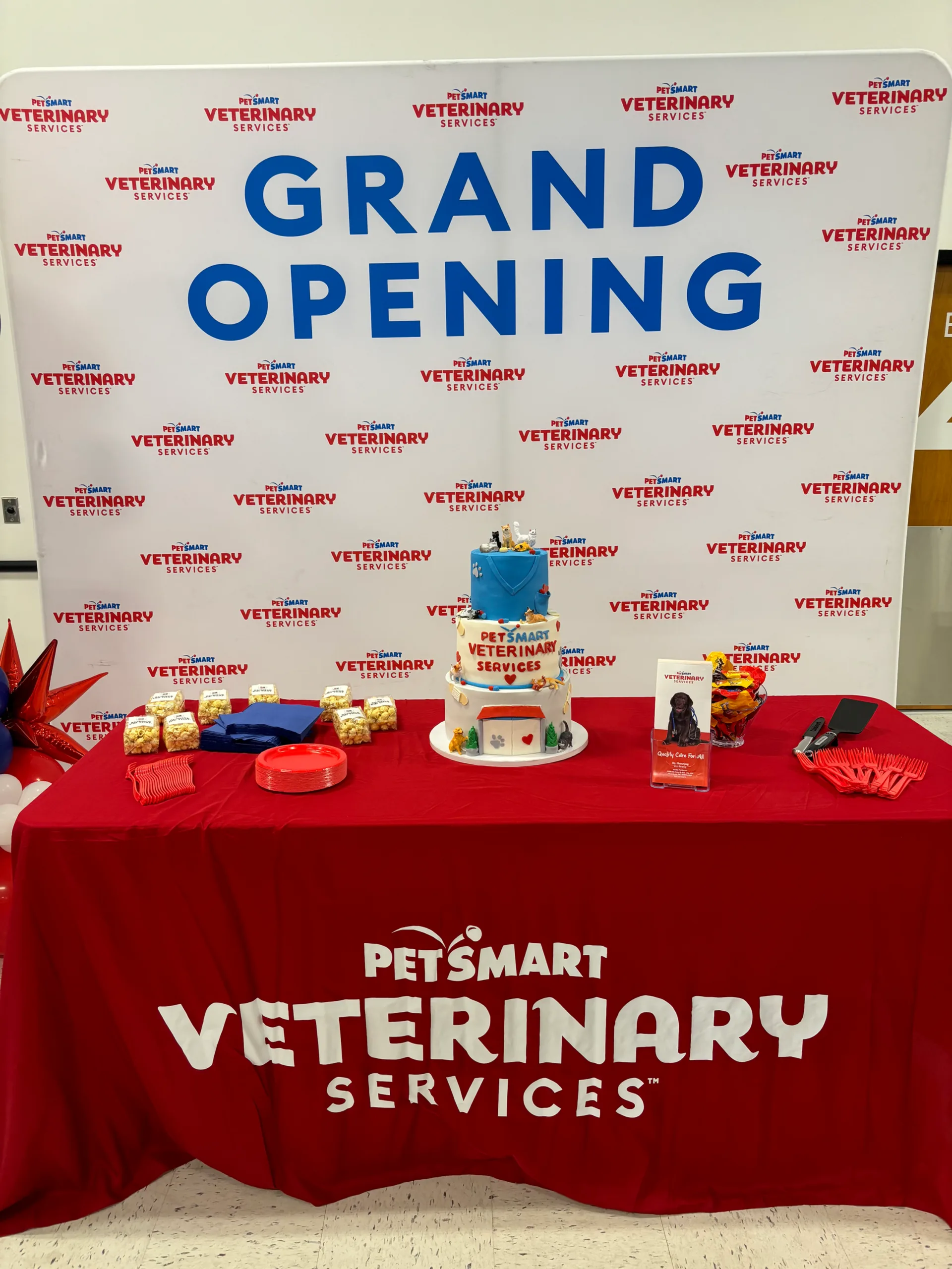 Grand opening graphics and cake